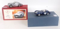 Lot 3190 - Two boxed 1/32 scale factory built slot cars...