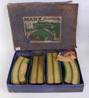 Lot 3195 - A Louis Marx Company tinplate and clockwork...