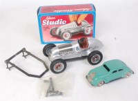 Lot 3219 - A Schuco and Lehmann tinplate vehicle group...