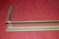 Lot 1187 - An Edwardian pierced brass kerb fender, w.125cm