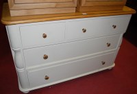Lot 1193 - A Laura Ashley contemporary oak topped, round...