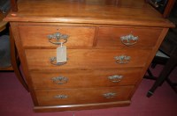 Lot 1200 - An Edwardian walnut square front chest of two...