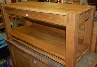 Lot 1207 - A contemporary light oak rectangular...