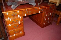 Lot 1234 - A reproduction yew wood twin pedestal writing...