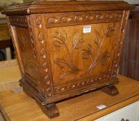 Lot 1240 - An early 20th century line carved oak...