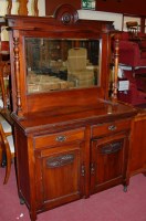 Lot 1256 - An Edwardian walnut mirrorback sideboard,...