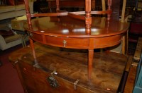 Lot 1266 - A contemporary walnut oval two drawer coffee...