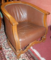 Lot 1290 - An early 20th century stained oak horseshoe...