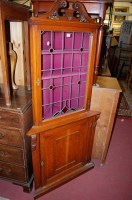 Lot 1319 - A late Victorian oak and coloured lead glazed...