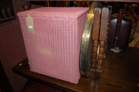 Lot 1336 - A Lloyd Loom pink painted wicker hinge top...
