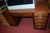 Lot 1341 - An Edwardian mahogany and rexine inset twin...
