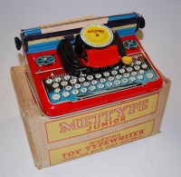 Lot 1531 - A Mettoy Junior tinplate and clockwork...