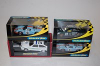 Lot 1587 - Four various boxed Scalextric slot cars, to...