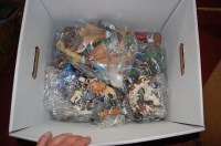 Lot 1607 - A box containing a quantity of plastic figures,...