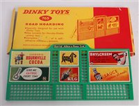 Lot 1939 - A Dinky Toys No. 765 road hoarding, comprising...
