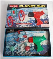 Lot 3214 - A Merit Toys  No. 3550 plastic planet gun...