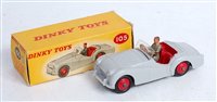 Lot 1974 - A Dinky Toys No.105 Triumph TR2 sports car,...