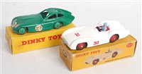Lot 2011 - A Dinky Toys boxed racing car group, two...