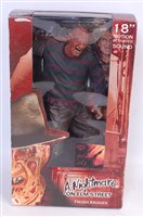 Lot 3283 - A Neca Real Toys 18'' motion activated sound...