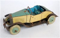 Lot 3289 - A Burnett of London tinplate and clockwork...