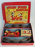 Lot 3291 - A Wells of London tinplate and clockwork...