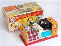 Lot 3296 - A Yonezawa tinplate and battery operated...