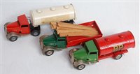 Lot 3345 - A Triang Minic clockwork dairy tanker together...
