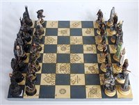 Lot 3326 - A Lord of the Rings chess set in two fitted...