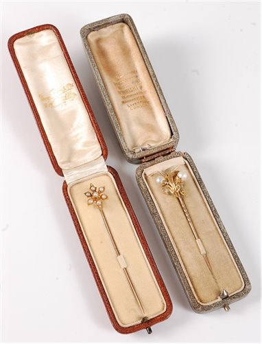 Lot 2502 - Two cased pearl stick pins, the first with two...