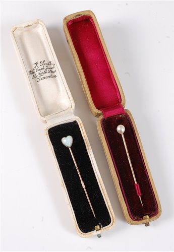 Lot 2511 - Two stick pins: the first set with a heart...