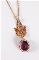 Lot 2582 - A 9ct amethyst pendant, the oval faceted...