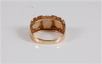 Lot 2594 - A 9ct opal and diamond ring, the three oval...