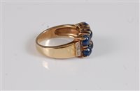 Lot 2591 - A 9ct sapphire and diamond ring, the six round...