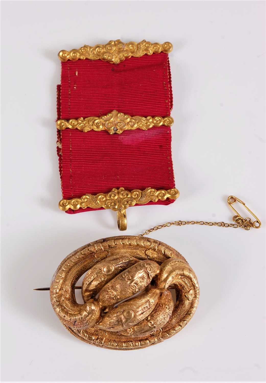 Lot 2585 - A 19th century brooch, the unmarked yellow...