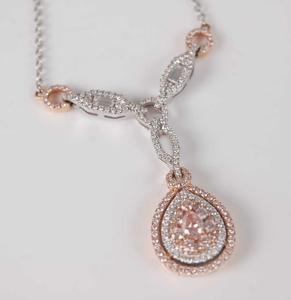 Lot 1172 - An 18ct white and rose gold fancy pear shaped...