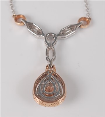 Lot 1172 - An 18ct white and rose gold fancy pear shaped...