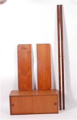 Lot 516 - A 1970s teak single division modular wall unit,...