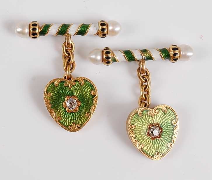 Lot 1191 - A pair of yellow metal cufflinks, each link...