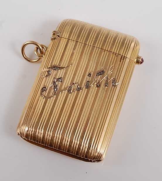 Lot 1188 - A yellow metal vesta case, the case having a...