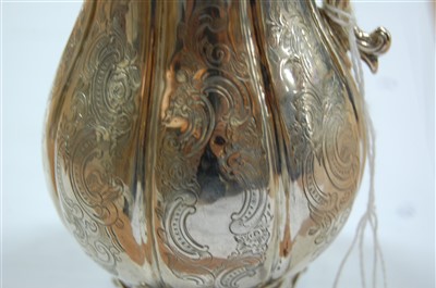 Lot 1116 - An early Victorian silver jug, of fluted...