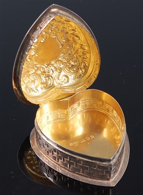 Lot 1124 - A modern silver heart shaped snuff box, the...