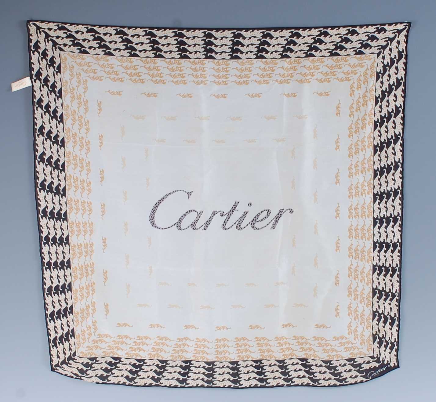 Lot 274 - A Cartier silk scarf, entitled Cartier to...