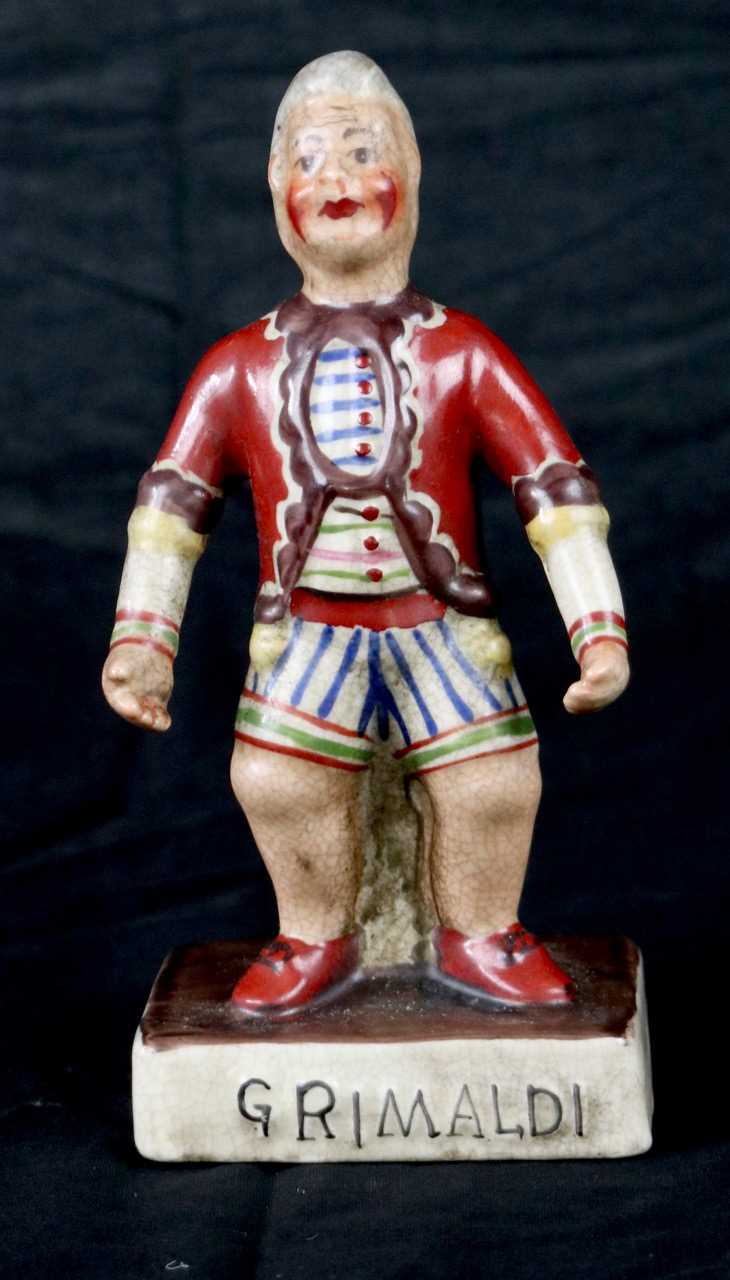 Lot 330 - Joseph Grimaldi pottery figure (1)