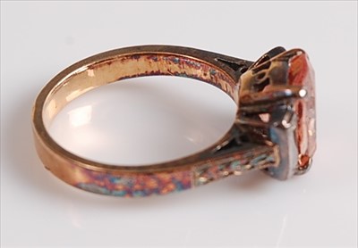 Lot 2129 - A yellow and white metal, pink sapphire and...