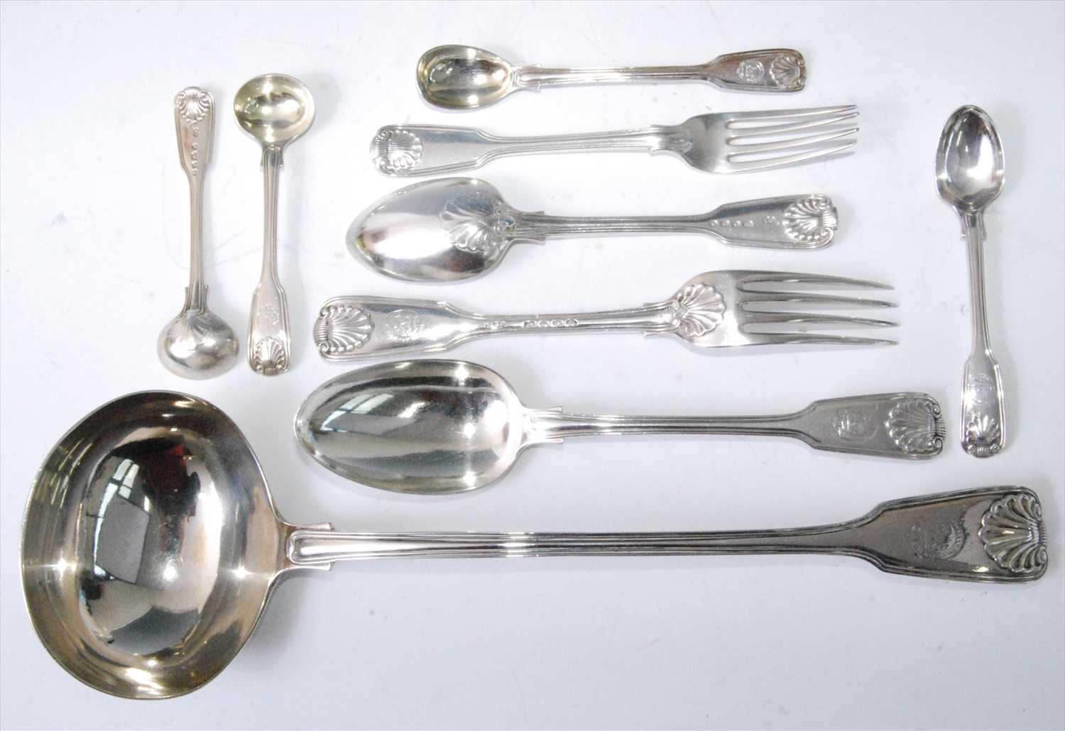 Lot 1177 - An early Victorian silver part cutlery suite,...