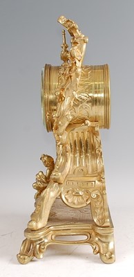 Lot 3 - A Rococo Revival gilt brass mantel clock, the...