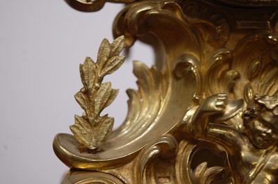 Lot 3 - A Rococo Revival gilt brass mantel clock, the...