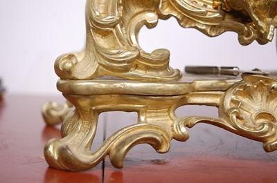 Lot 3 - A Rococo Revival gilt brass mantel clock, the...