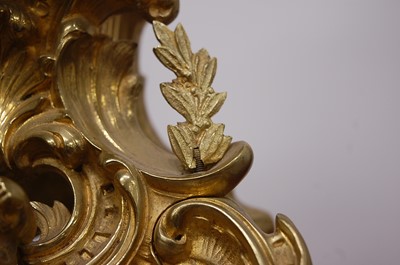 Lot 3 - A Rococo Revival gilt brass mantel clock, the...