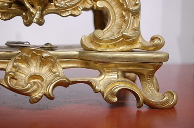 Lot 3 - A Rococo Revival gilt brass mantel clock, the...